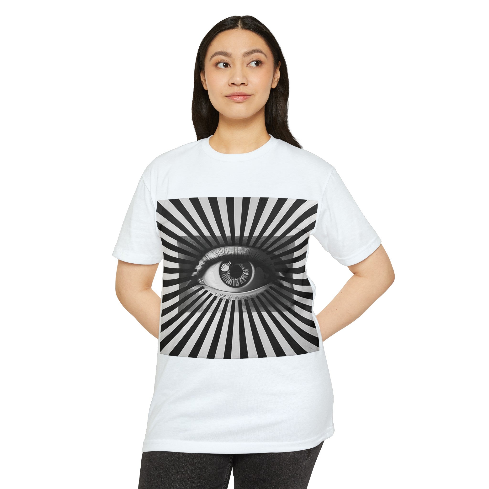 The image features a stylish unisex CVC jersey t-shirt, adorned with a captivating optical illusion eyeball design. The detailed and dynamic graphic appears to change and move, playing tricks on the eye. The tee’s soft, comfortable fabric and modern fit are also highlighted, making it an ideal choice for anyone who appreciates unique and artistic fashion.