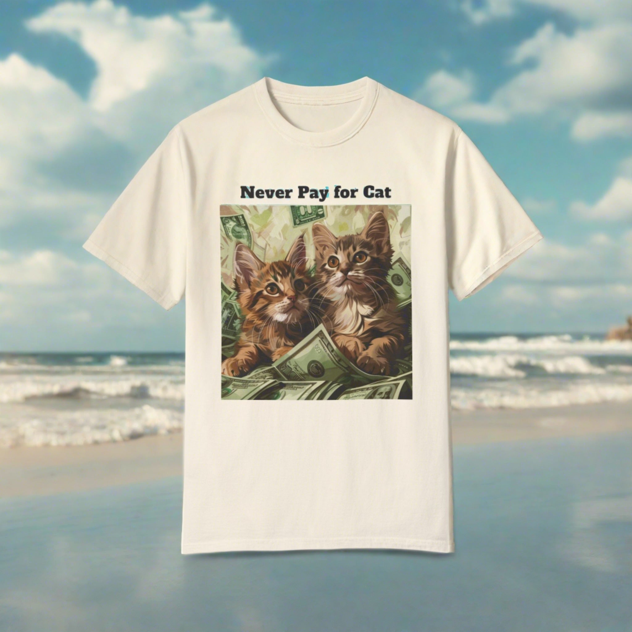 The image presents a unisex garment-dyed t-shirt in a relaxed fit, showcasing an adorable and humorous graphic of kittens frolicking in a pile of cash, with the witty phrase "Never Pay for Cat Dating" prominently displayed. The playful design is set against the shirt's high-quality, soft fabric, highlighting both the art's detail and the garment's comfortable feel.