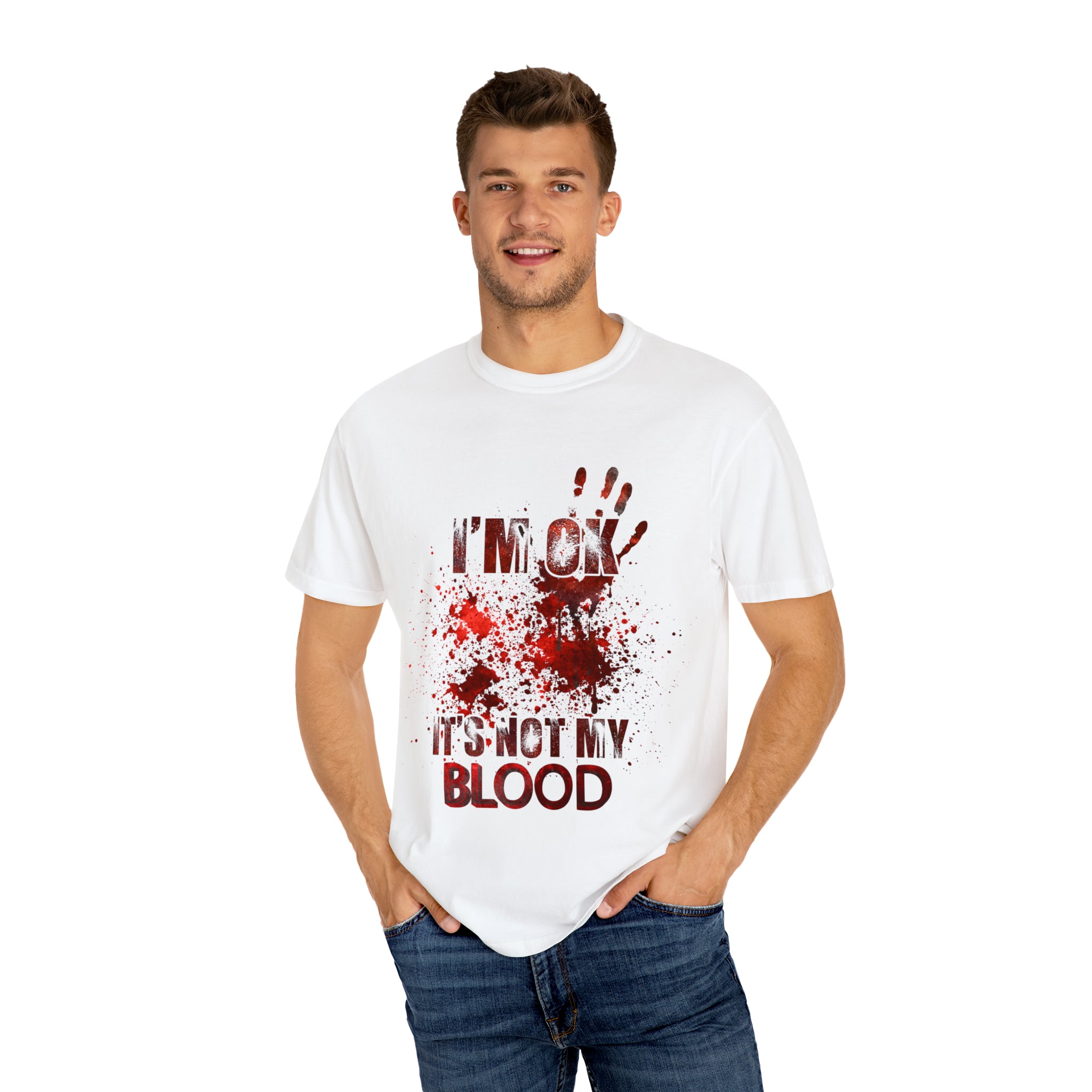 The image features a unisex garment-dyed t-shirt displaying a humorous scene of a zombie fight with the text "I'm OK..." splashed across in bold, eye-catching letters. The design emphasizes both the comedy and the horror elements, perfectly balancing the two for fans of both genres. The shirt's quality fabric and faded color palette enhance the vintage, laid-back vibe, making it an essential addition to any casual wardrobe.