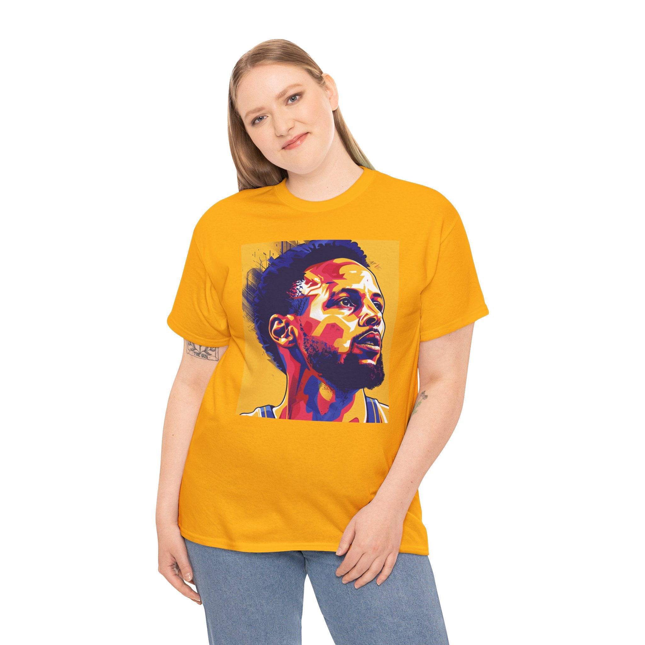 The image showcases a high-quality unisex heavy cotton tee in a classic cut, featuring vibrant graphics that pay homage to the legendary 3-point shooter, Steph. The design captures the excitement and precision of his game, making it an essential addition to any basketball fan's wardrobe