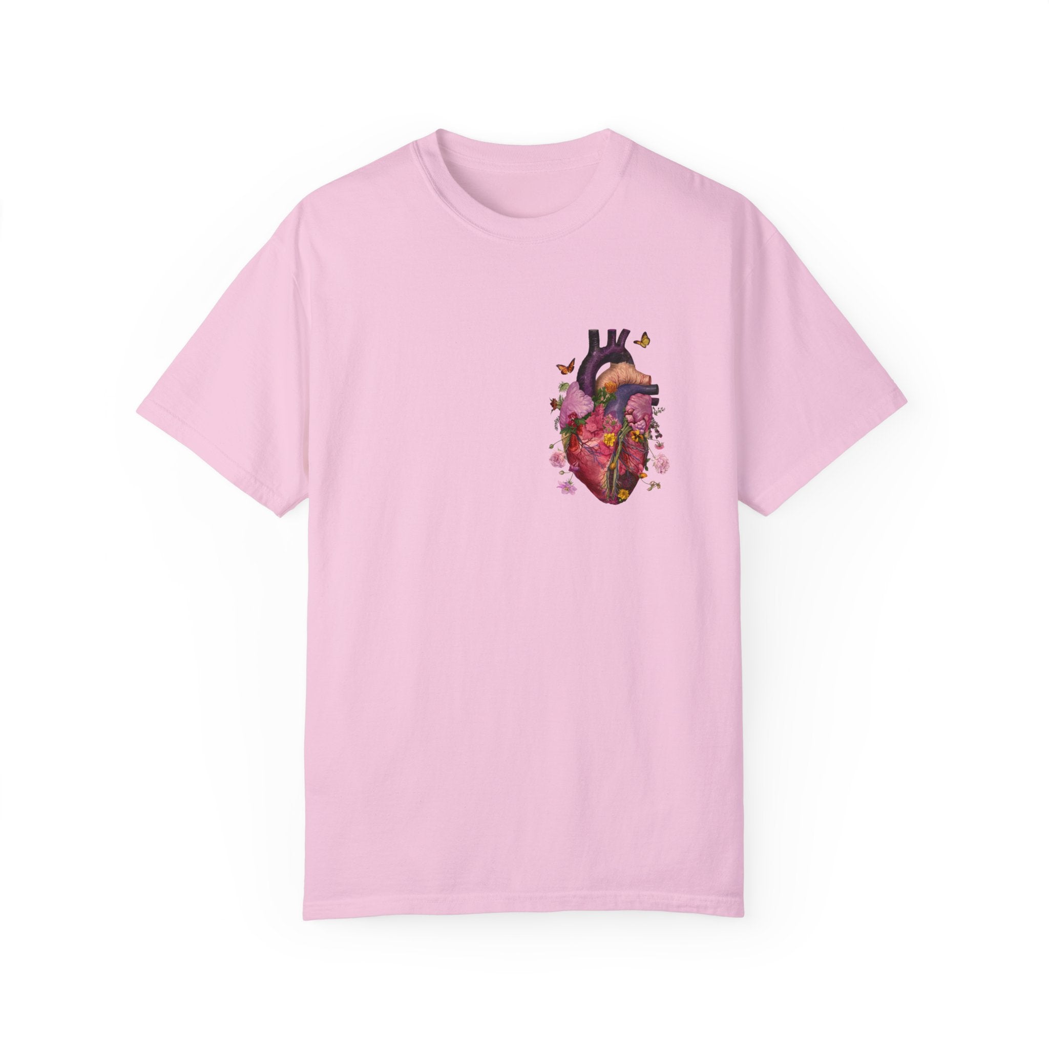 The image showcases a stylish unisex garment-dyed t-shirt, featuring a beautifully detailed illustration of a human heart intertwined with floral elements. The soft, comfortable fabric and relaxed fit are also highlighted, making it an ideal choice for any casual setting. #shopping #Shop #Shirt