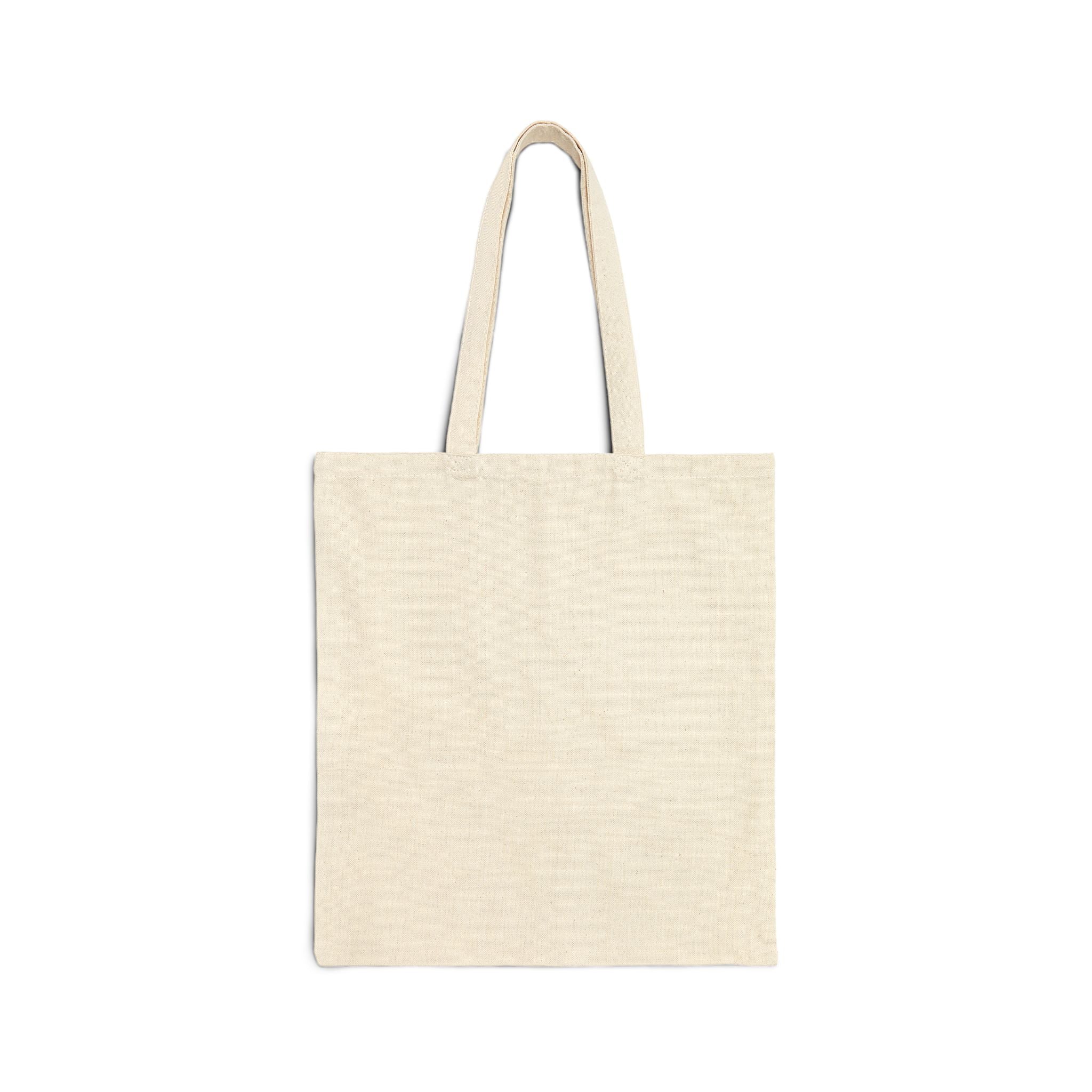 The image showcases a cotton canvas tote bag featuring a beautifully crafted musical heart design. The durable material and spacious interior are also highlighted, making it an ideal choice for everyday use.