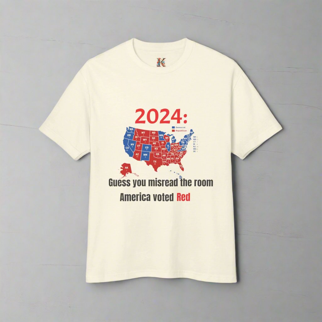 The image showcases a unisex garment-dyed heavyweight cotton tee featuring a red-dominated map of the 2024 US election results with the phrase “Guess You Misread the Room: America Voted Red." The high-quality fabric and relaxed fit provide both style and comfort.