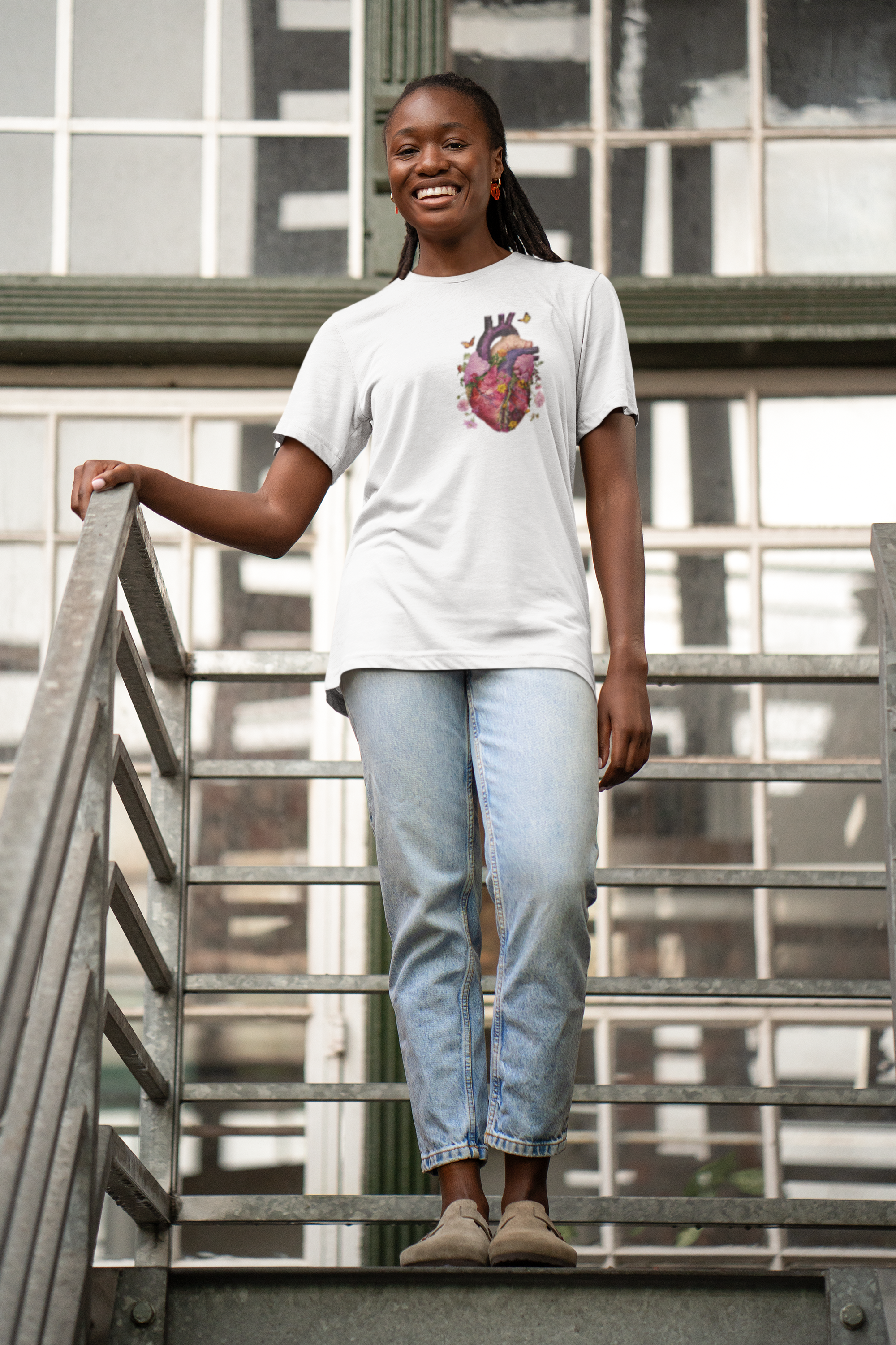 The image showcases a stylish unisex garment-dyed t-shirt, featuring a beautifully detailed illustration of a human heart intertwined with floral elements. The soft, comfortable fabric and relaxed fit are also highlighted, making it an ideal choice for any casual setting. #shopping #Shop #Shirt